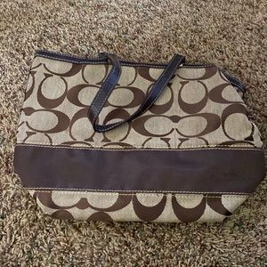 Large Coach outlet bag from coach outlet Store. Brown. Coach logo.